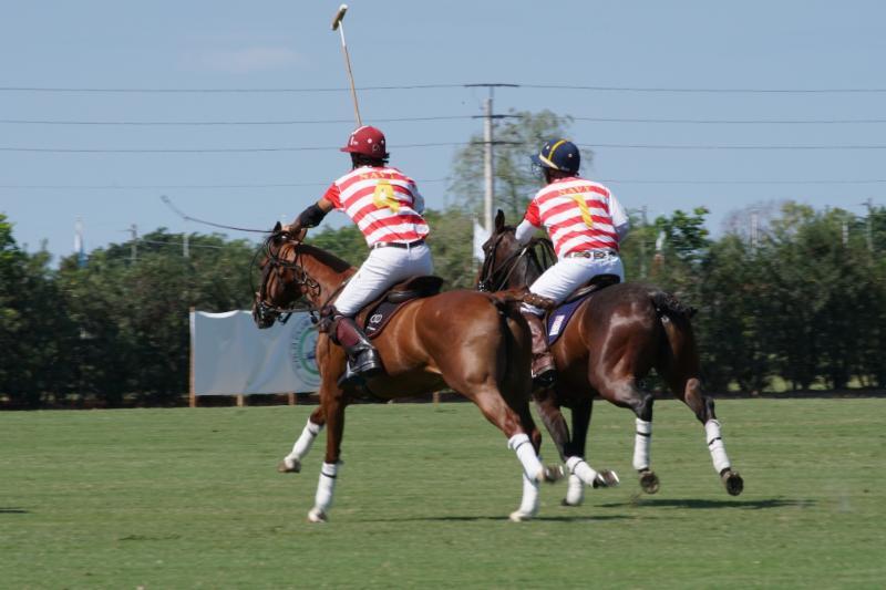 Navy teammates Alejandro Novillo Astrada and Karl Hilberg working together downfield. Photo courtesy ChukkerTV.
