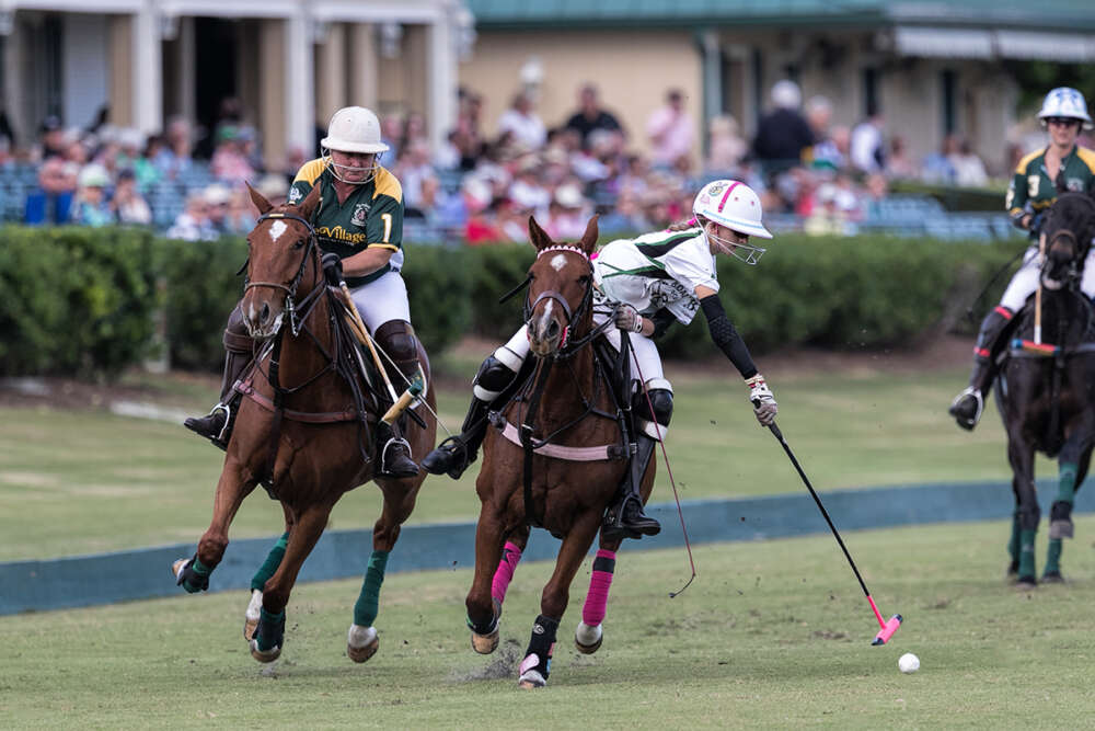 Most Valuable Player Hope Arellano of Bendabout shoots on the nearside, The Villages Teresa Connelly in defense.
