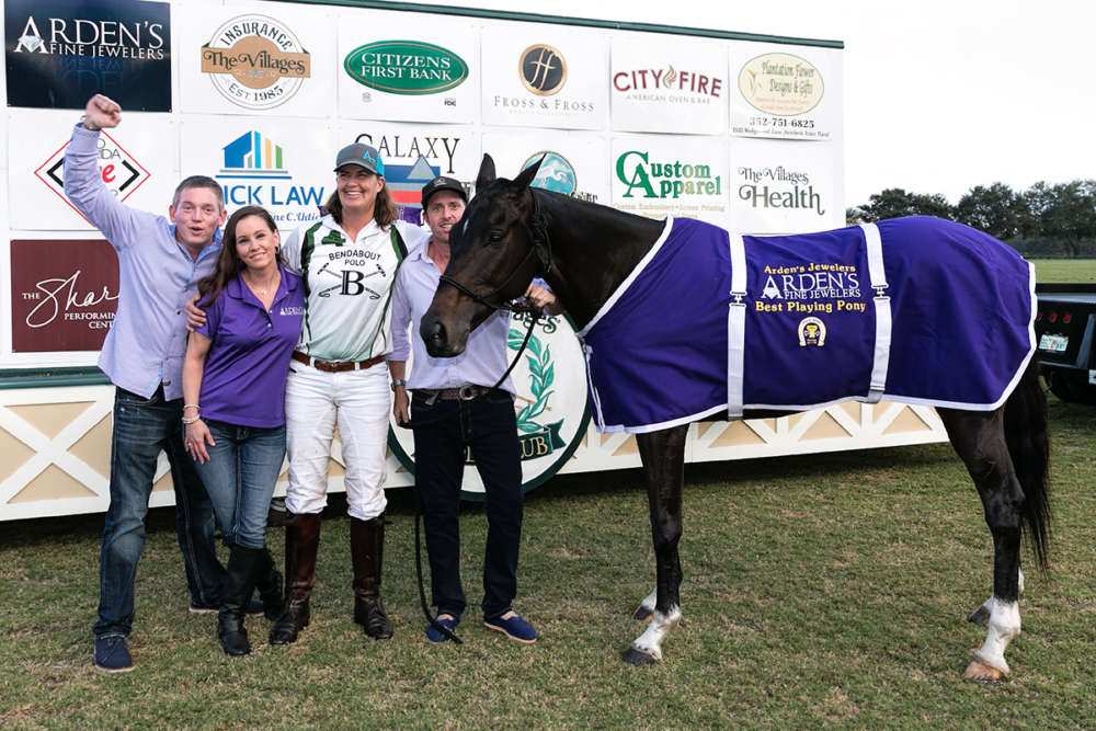 Best Playing Pony Noche played by Gillian Johnston, owned by Francisco Bilbao, pictured with Alfredo Azaro and Arden's Fine Jewelers Kate and Blake Gallaher.