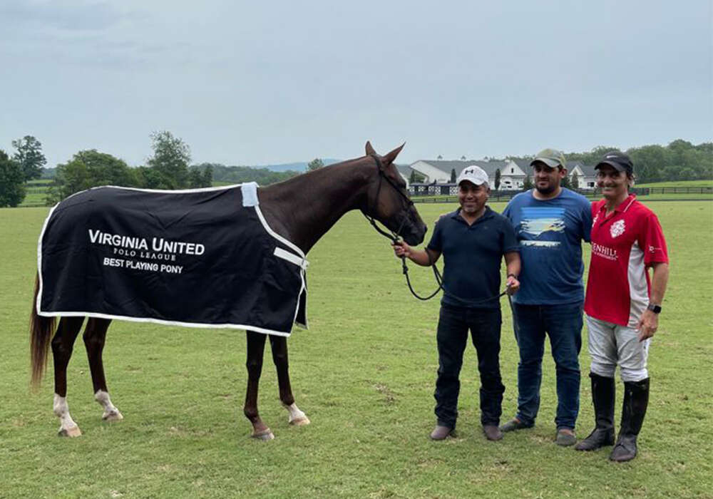 Best Playing Pony, Tickle Red, played by Gaston Lisioli. Pictured with Grooms Nicolas Caraballo and Mario Baruch.
