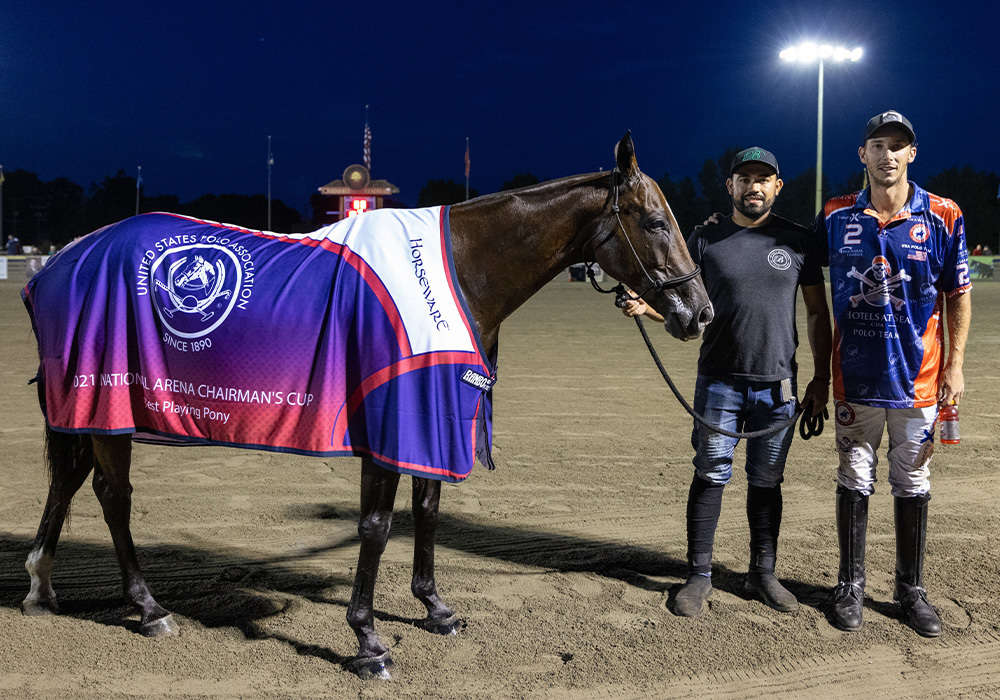 Best Playing Pony Yatay Alcon, played by Tolito Fernandez Ocampo and owned by Bill Ballhaus. Pictured with groom Josue Tercero.