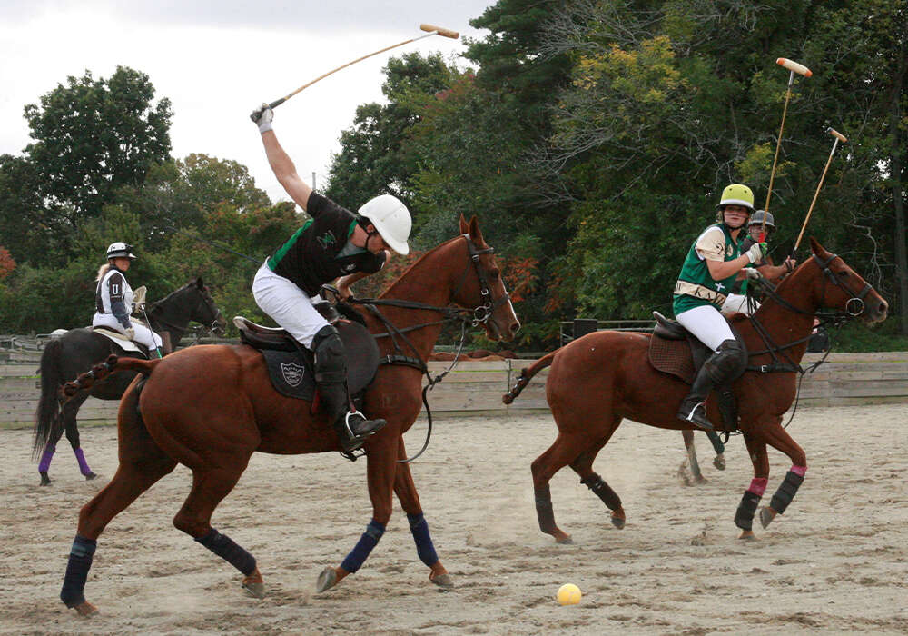Boston Polo Club's Justin Daniels displays a gorgeous forehand shot.