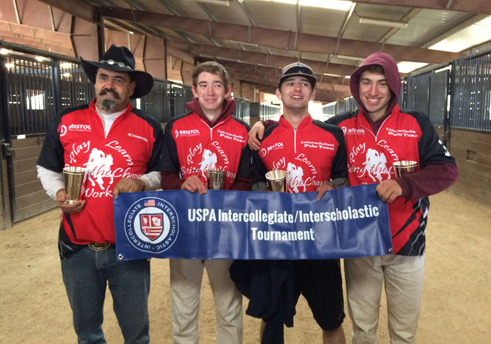 (L to R) Coach Dan Coleman, Brian Burby, Thomas Phelps, and Zackary Coleman.
