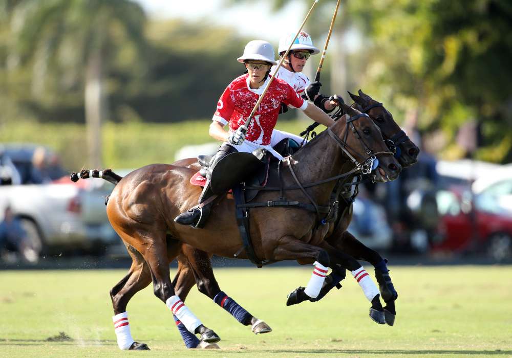 Coca-Cola's Mackenzie Weisz rides off Scone's Poroto Cambiaso during the 2021 GAUNTLET OF POLO®. ©David Lominska