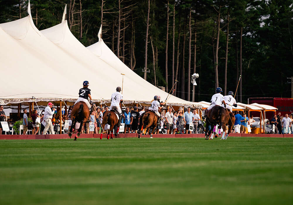 Lamborghini and Rolls Royce participated in a thrilling match played before a large charity crowd.