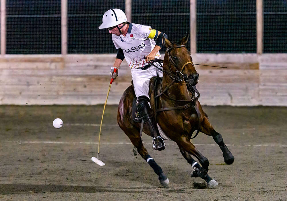 England's Eden Ormerod changes directions while hitting the ball mid-air.