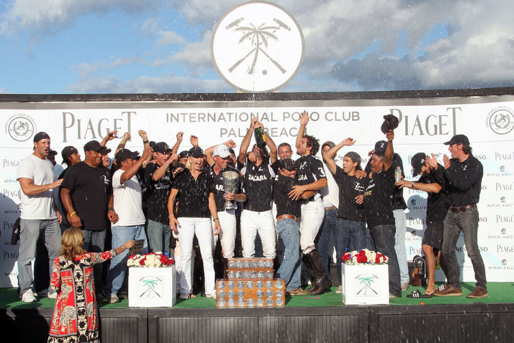 Judith Baker celebrates with Zacara during their 2012 U.S. Open Polo Championship® victory! ©David Lominska