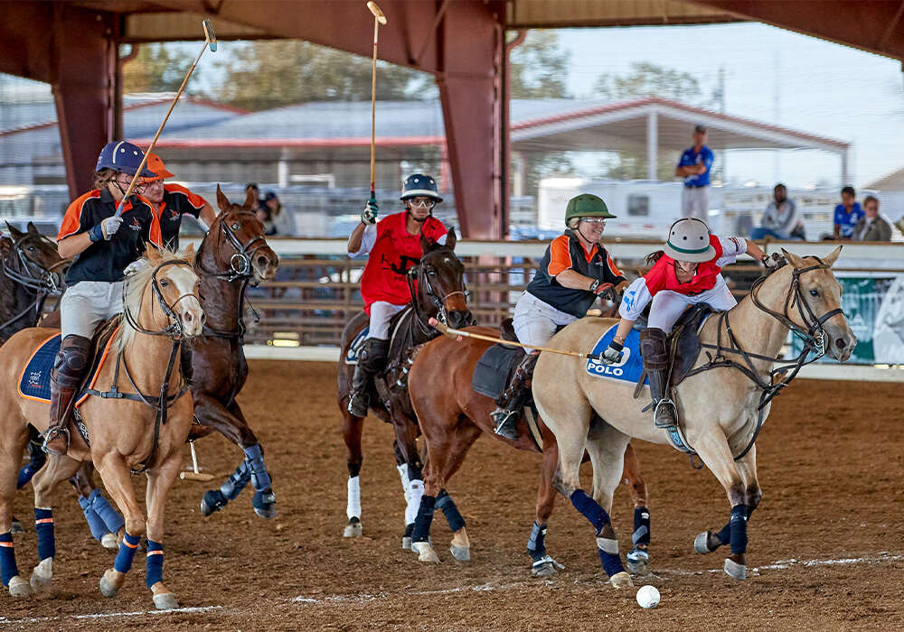 JD Boss Polo's Sophie Michels prepares to hit a forehand shot.