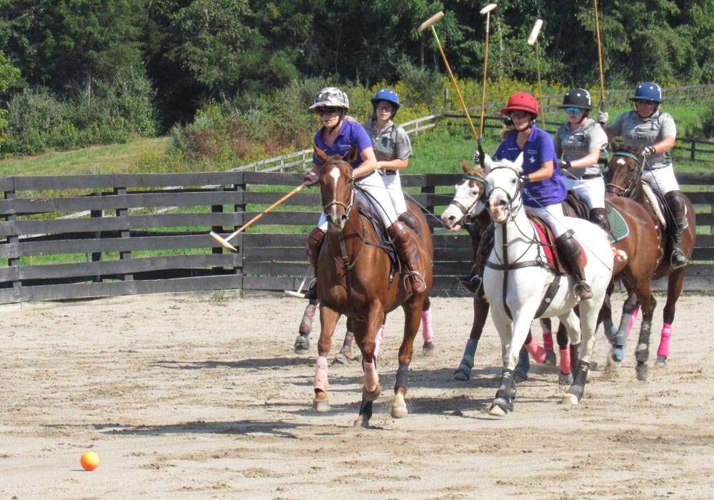 Money Pit Manor's Erica Tergeson leads the pack on a breakaway.