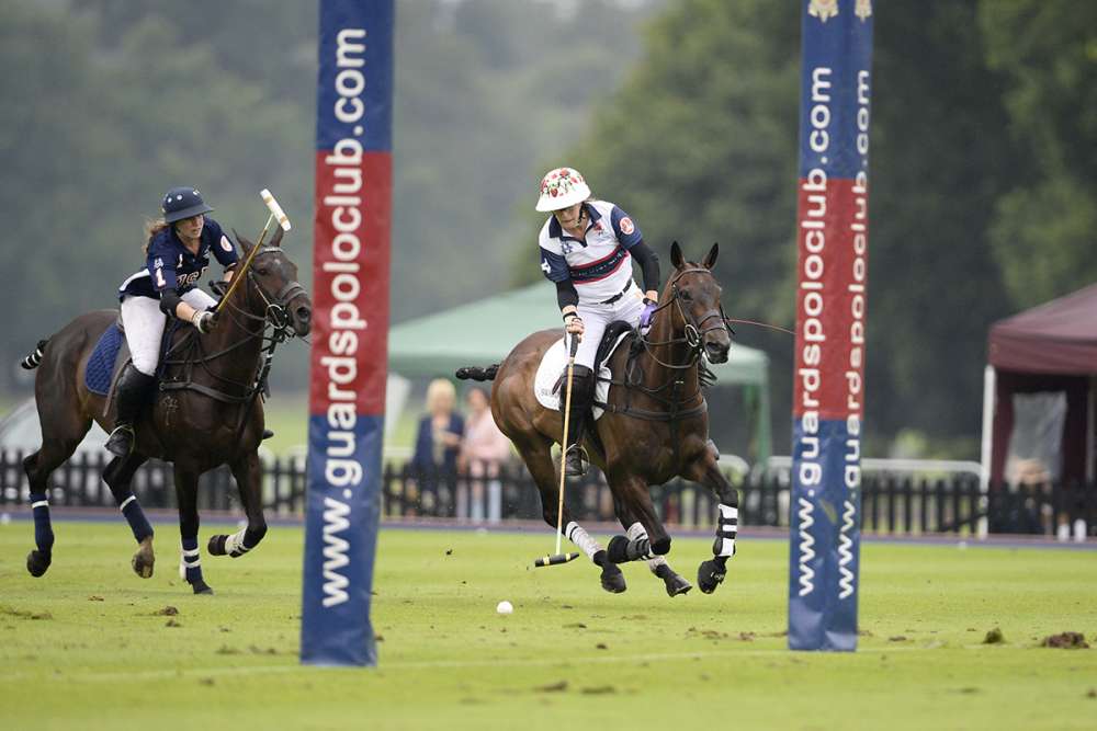 England's Nina Clarkin carries the ball through the goal mouth.