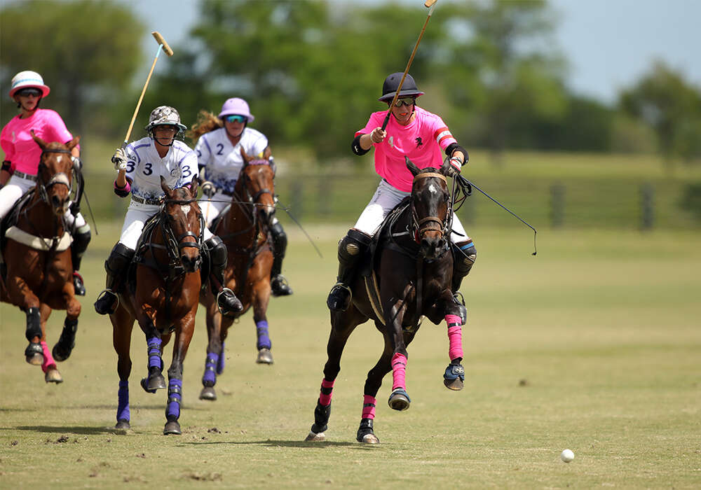 Dundas' Nina Clarkin leads the pack in the 2021 U.S. Open Women’s Polo Championship® at Port Mayaca Polo Club. ©David Lominska