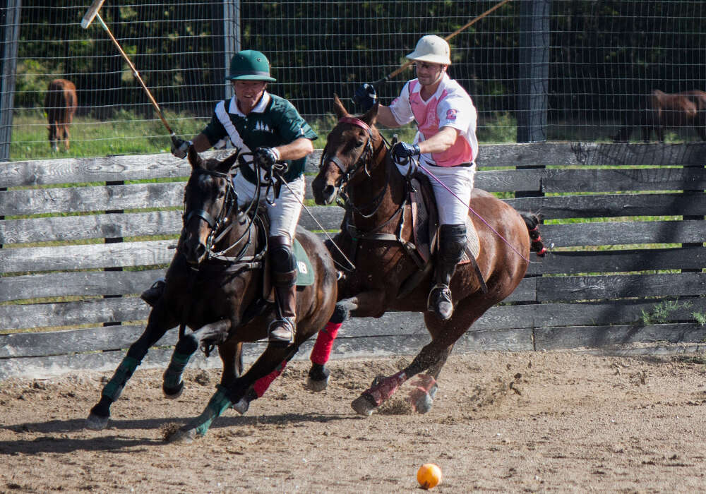 Three Trees' Will Boland in a race for possession with Most Valuable Player, Orea Polo's Nik Feldman. ©Lindsay Dolan