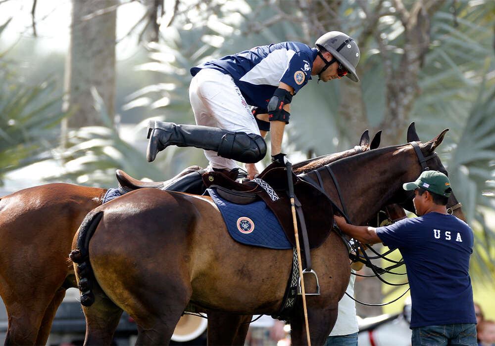 USA player switches polo ponies during the 2017 XI FIP World Polo Championship Zone Playoffs at the International Polo Club Palm Beach, in Wellington, Florida. ©David Lominska