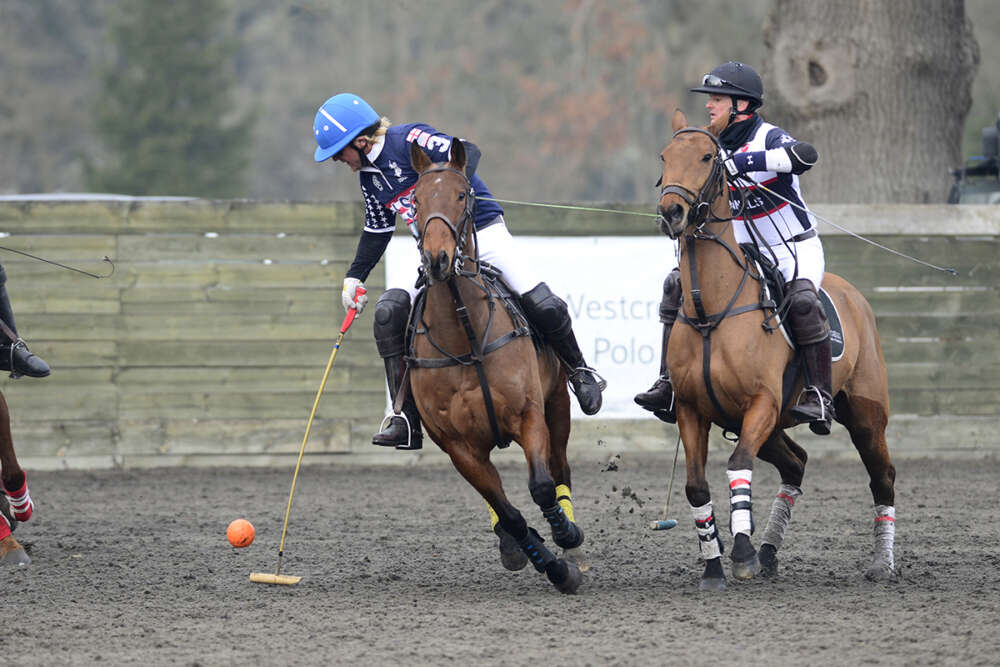 USA's Shane Rice on the ball with England's Sebastian Dawnay coming in to defend. 