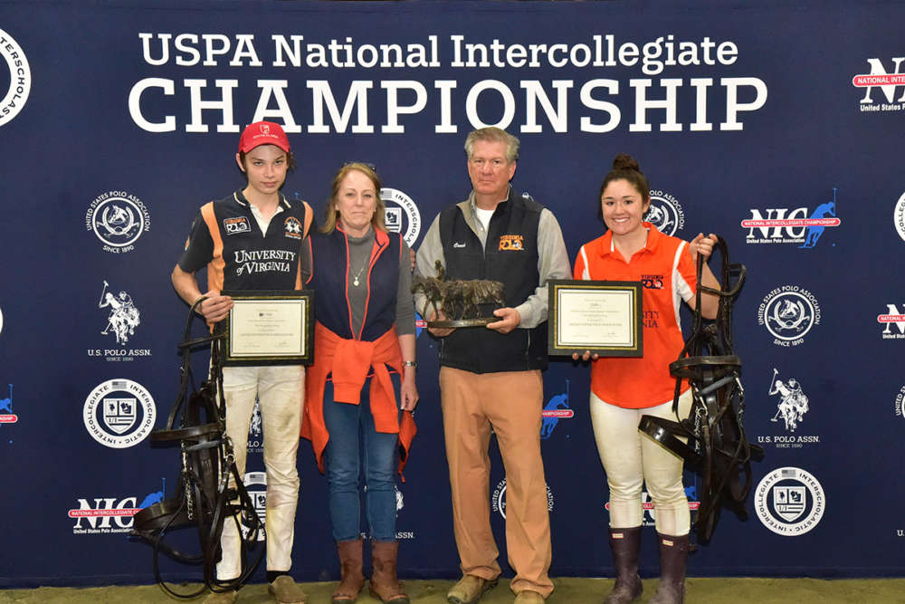 UVA's captains Jack McLean and Sadie Bryant recieving the Best Playing String trophy from Ellen and Lou Lopez