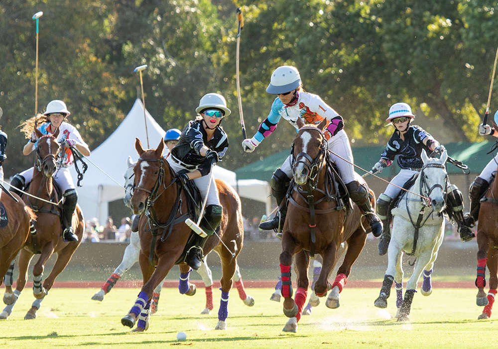 Iconica Kylie Sheehan attempts to hook Polo Gear Coffee Company's Dawn Jones.