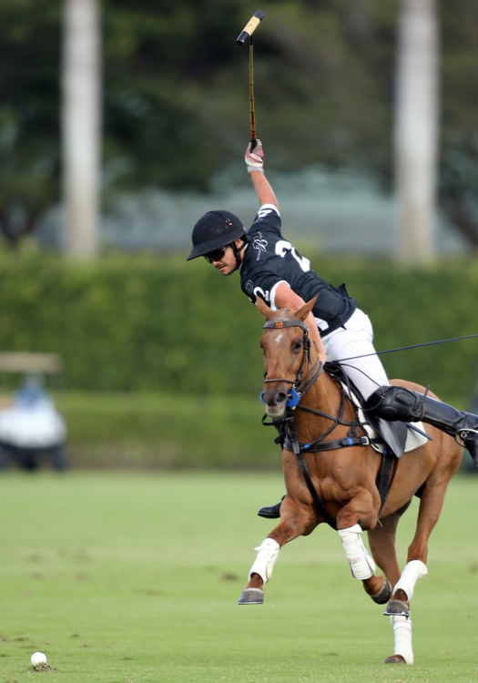 Beverly Polo's Lucas Diaz Alberdi hits an electric forehand shot.