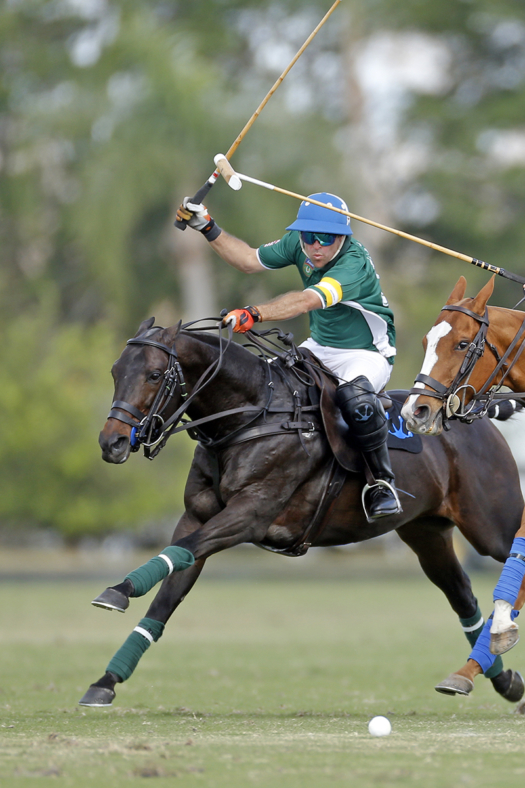 Sapo Caset and Popular race down field at top speed during the 2018 Ylvisaker Cup at International Polo Club Palm Beach. ©David Lominska