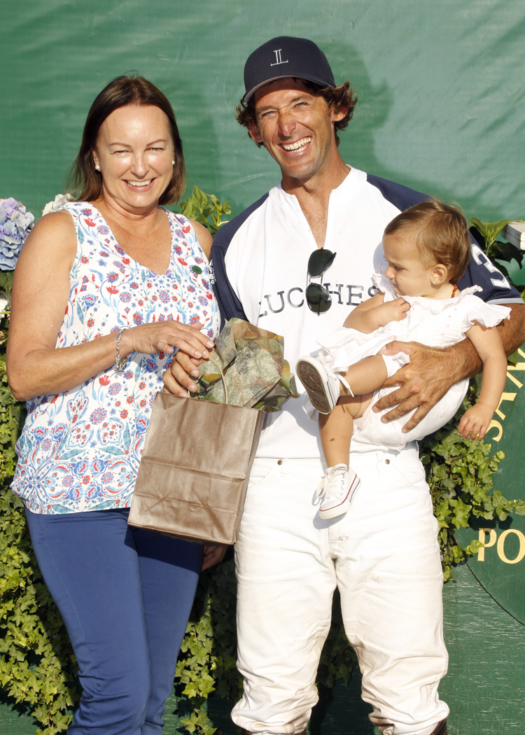 Kelly Smith Remmling from Jackson Hole Horse Emporium presented the Most Valuable Player Award to Agustin Molinas. 