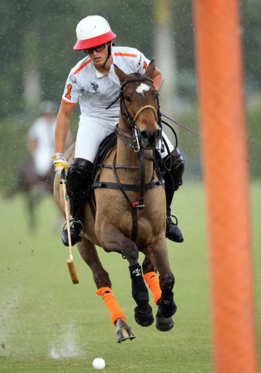 La Fe's Lucas Escobar battles the elements on a breakaway goal.