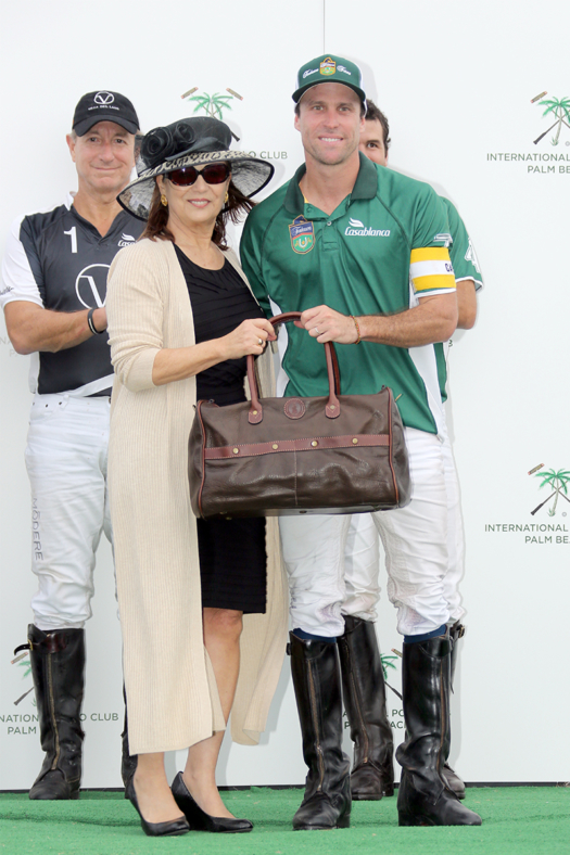 Most Valuable Player Sapo Caset pictured with Brenda Lynn of the Museum of Polo and Hall of Fame.