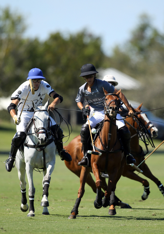 Old Hickory Bourbon's leading scorer Joaquin Panelo pushes downfield with Beverly Polo's Hilario Figueras at his hip.
