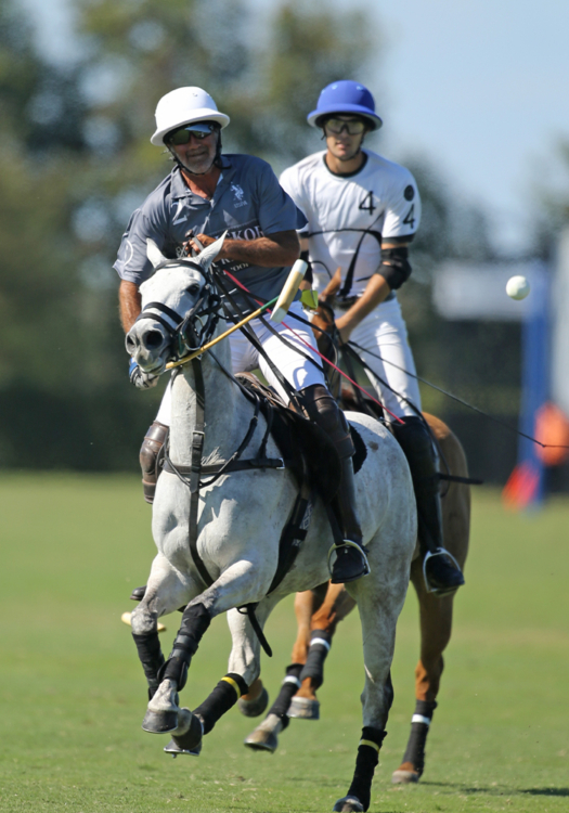 Old Hickory Bourbon's Matias Magrini keeps his eye on the ball ahead of Beverly Polo's Hilario Figueras.