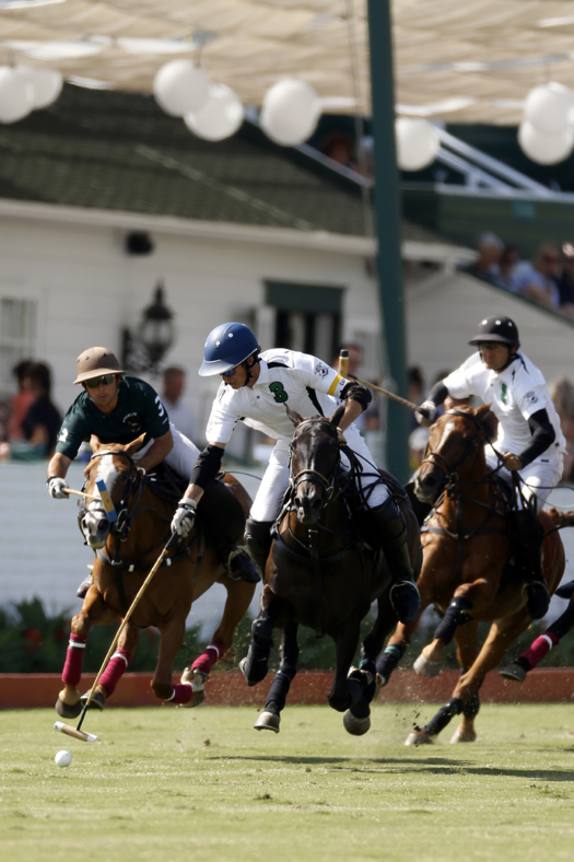 Viana and Nochebuena lead the field at full speed during the 2018 Vic Graber Memorial at Santa Barbara Polo & Racquet Club. 