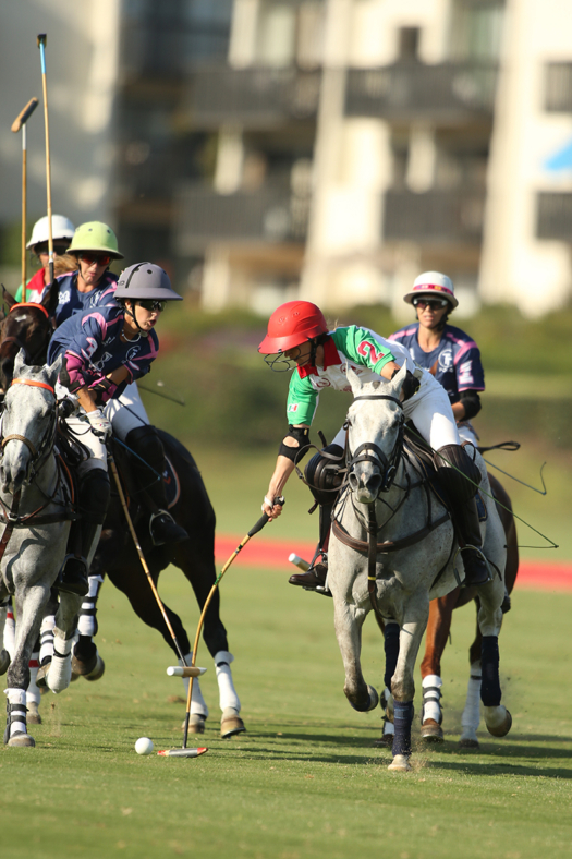 Timing's Mia Astrada attempts a hook with on La Herradura's Meghan Gracida.